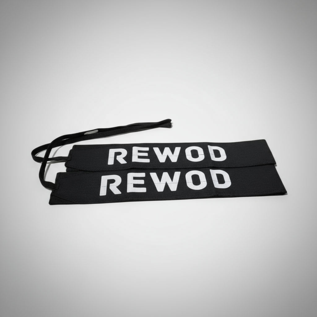 Black resistance bands with 'REWOD' text on a white background