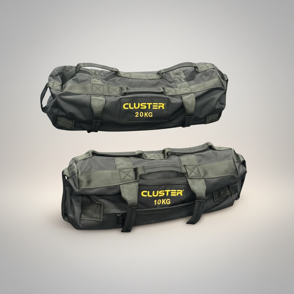 Two Cluster sandbags with visible weight labels on a gray background